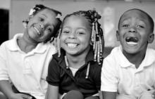 three smiling children