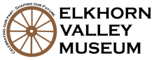 Wagon wheel logo with Elkhorn Valley Museum spelled out